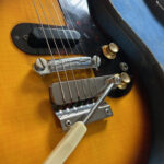 1965 Asymmetrical Cut Epiphone Olympic bridge