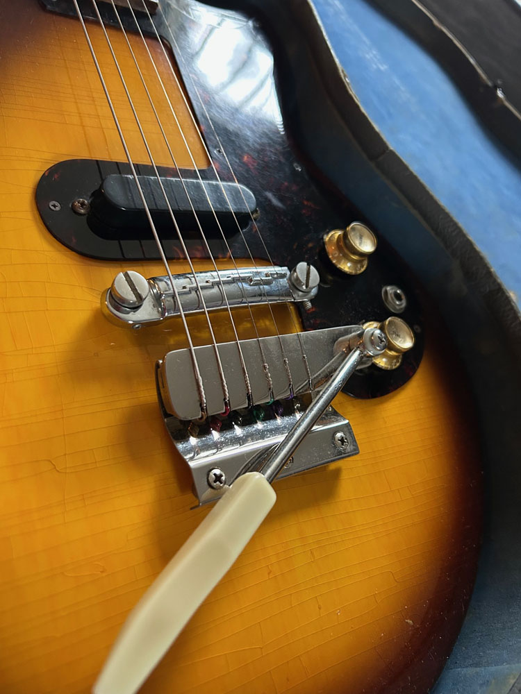 1965 Asymmetrical Cut Epiphone Olympic bridge