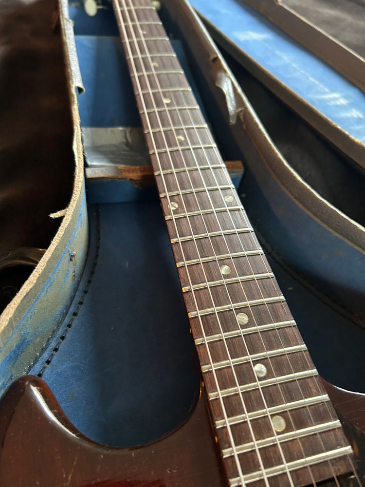 1965 Asymmetrical Cut Epiphone Olympic fingerboard