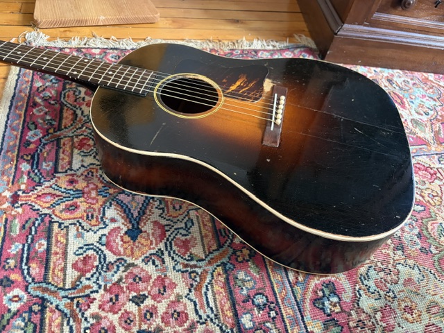 Just unearthed from Dallas, a 1934 Gibson Jumbo. Original finish, perfect setup, and superior sound. Top, back, neck, and sides feature the same burst finish. Only 24 FONs are accounted for.